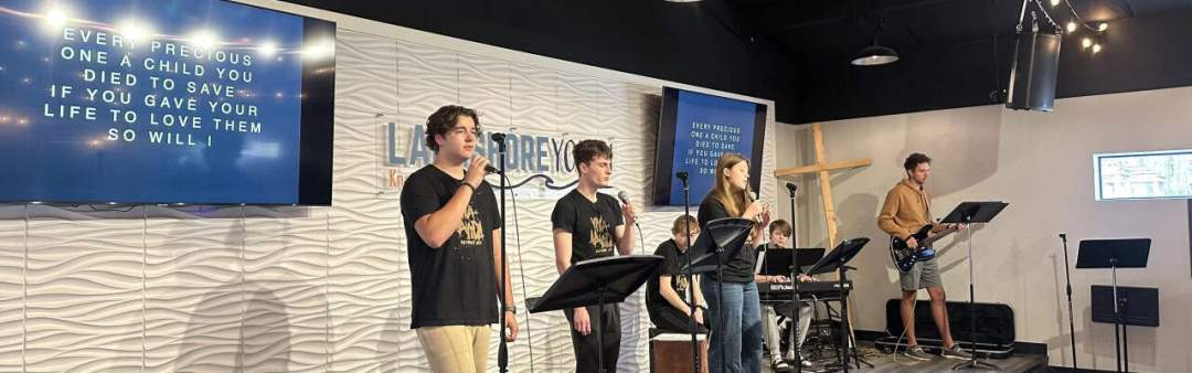 students singing worship songs