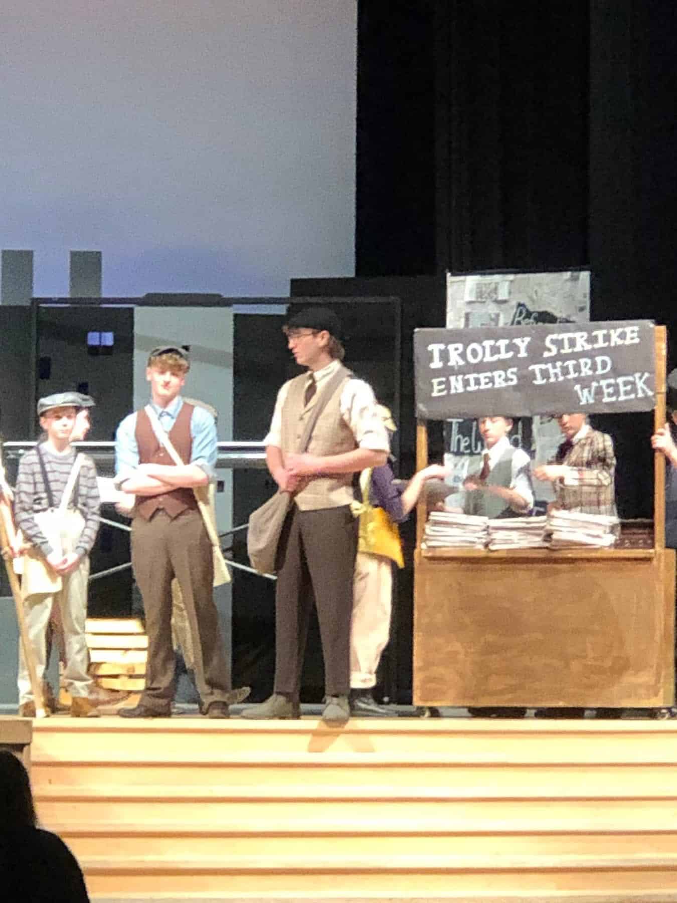 Students performing a stage production